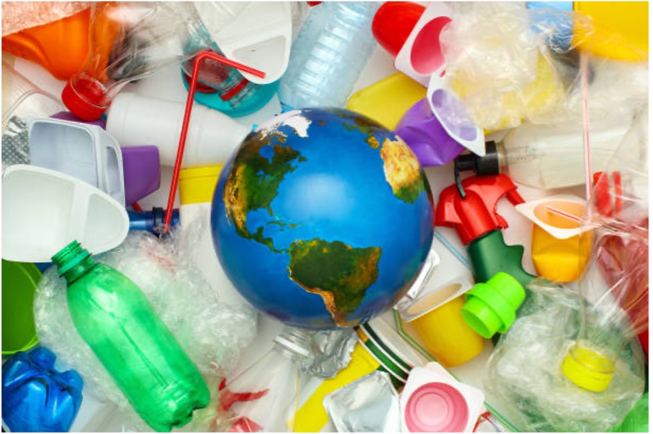 Plastic waste surrounding a globe.