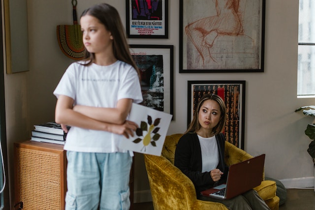 Mother and daughter looking frustrated with eachother.
