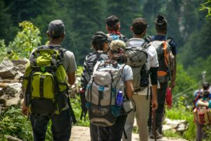 group of hikers carrying backpacks
