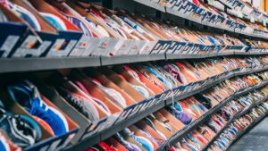 sneakers in boxes on shelves