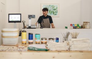 Man behind a store counter