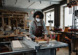 A woman doing carpentry
