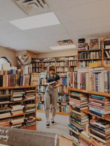 A person walking through a book store
