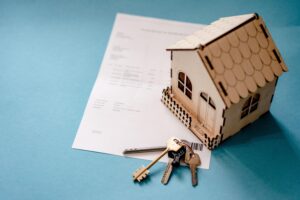 A small model house with keys