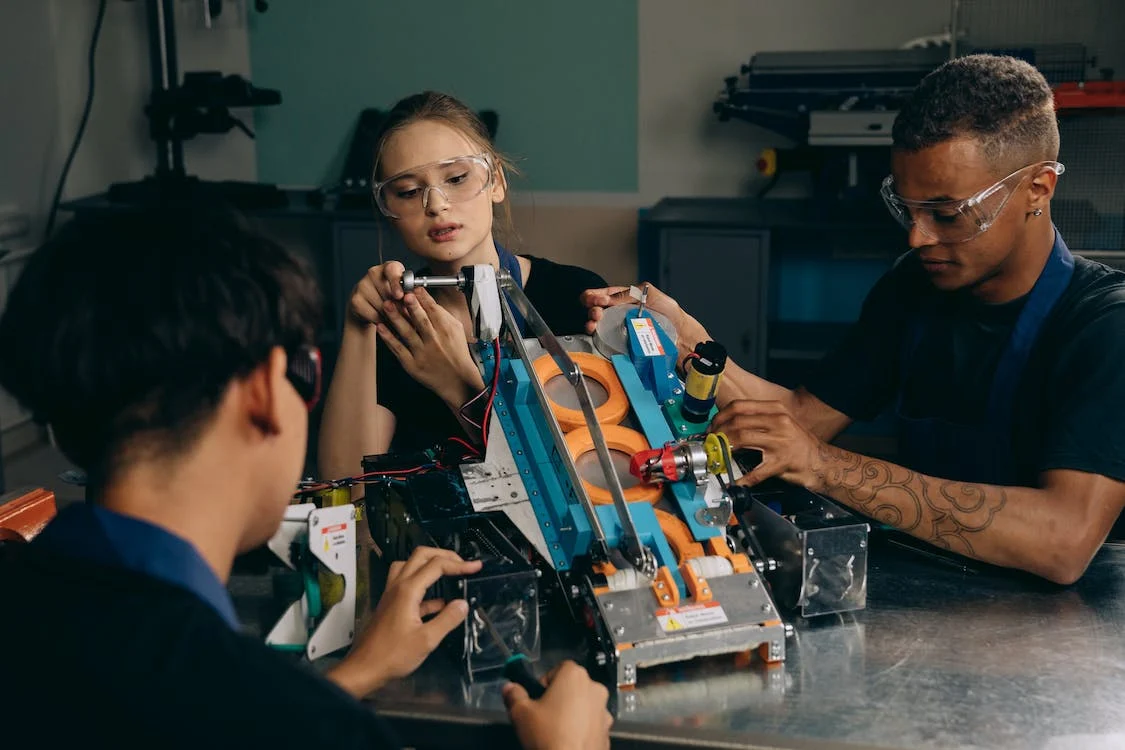 A group of students working on a robotics project